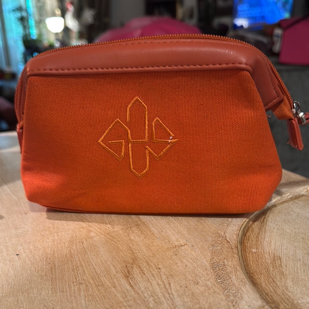 Orange Leather Cosmetic Case with Embossed Design